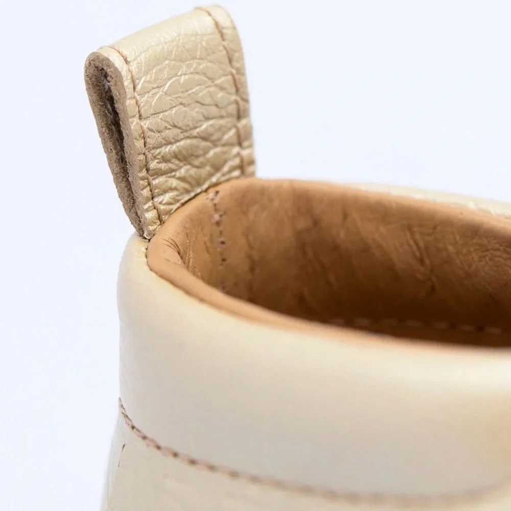 Freshly Picked Platinum Sneaker Moccs size 8